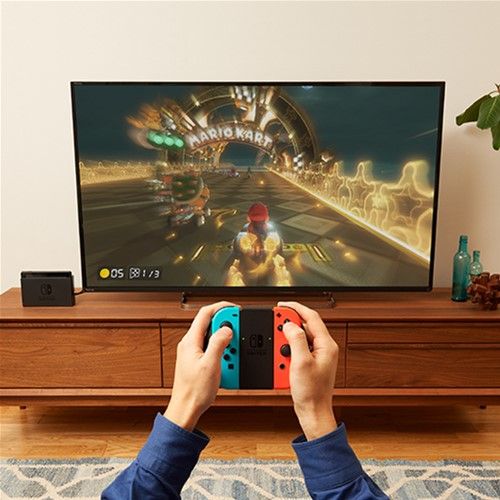 Портативная игровая приставка Nintendo Switch with Neon Blue and Neon Red Joy-Con (045496452629) 00000329 фото