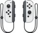 Портативна ігрова приставка Nintendo Switch OLED with White Joy-Con (045496453435) 00000327 фото 5